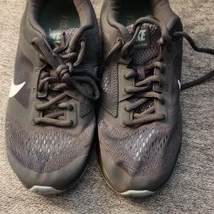 Nike Gray Athletic Sneakers with Teal Highlights
